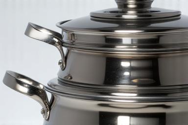 Stack of durable stainless steel pots and pans.